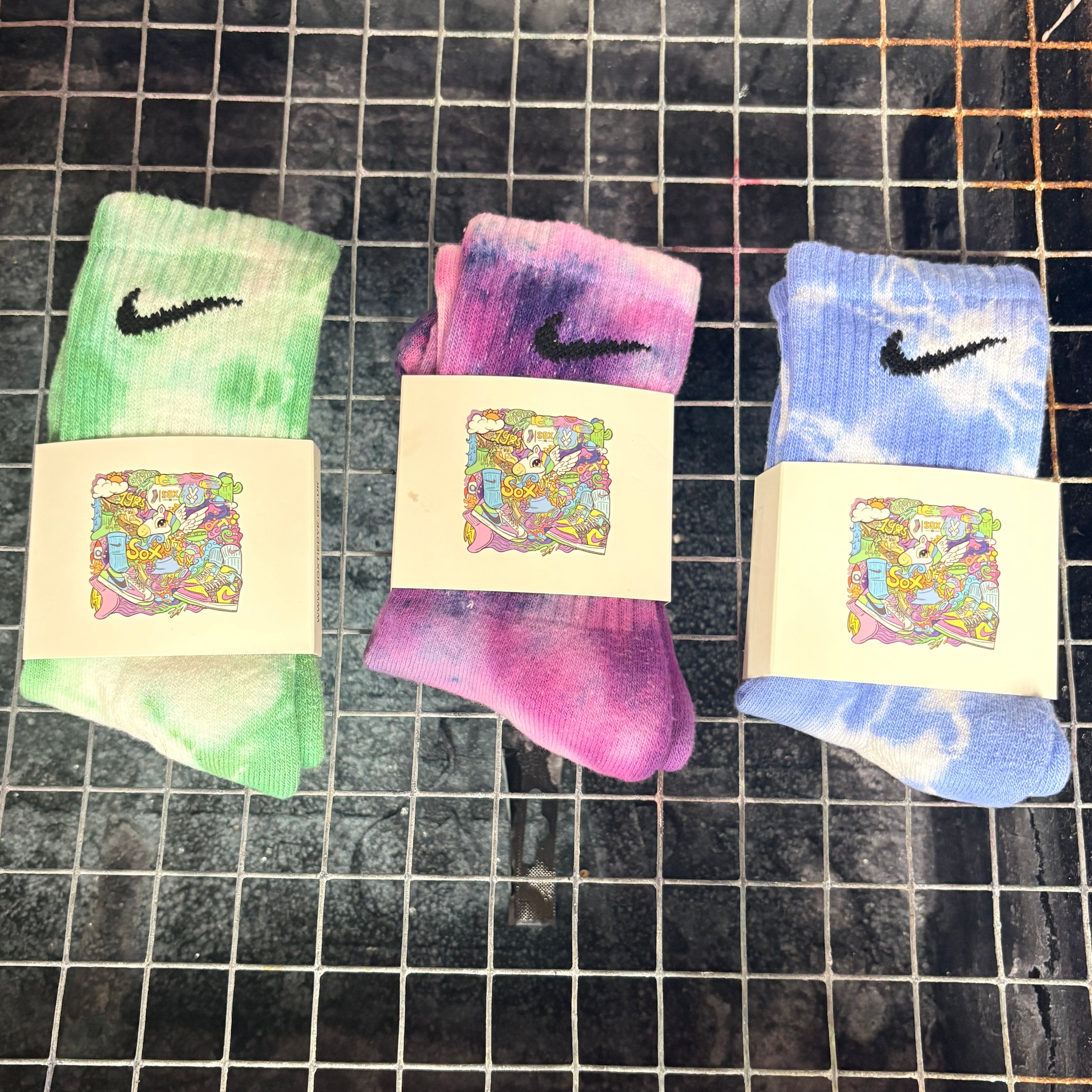 3 pairs of small tie dye Nike socks
